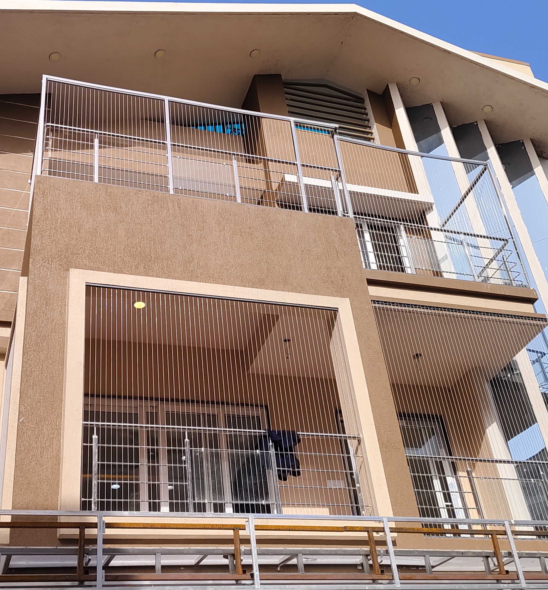 Invisible Child Safety Grill installation for balcony protection